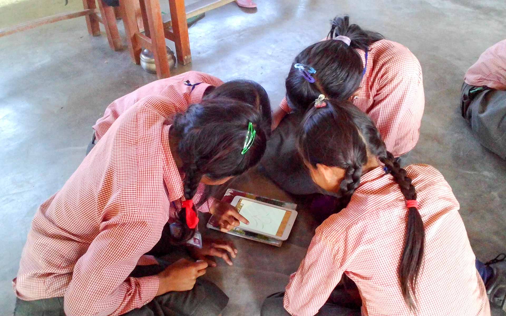nepal girls with tablet